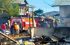 PETUGAS pemadam kebakaran di Kepsul saat melakukan pemadaman api di pasar Basanohi, Kecamatan Sanana, Minggu (23/1/202)